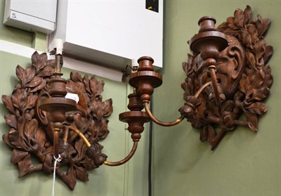 Lot 1473 - Pair of carved wall lights