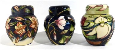 Lot 13 - A Modern Moorcroft Orchid Arabesque Pattern Ginger Jar and Cover, designed by Emma Bossons, 11cm; A