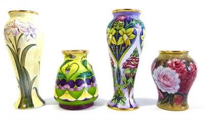 Lot 49 - A Group of Four Moorcroft Enamel Vases, comprising: Heartsease, Peony 20/75, Diamond Jubilee...