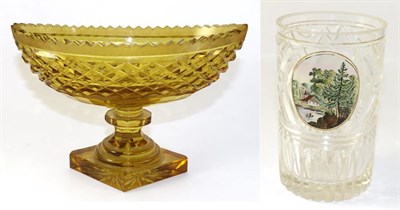 Lot 137 - An Anglo-Irish Amber Glass Pedestal Bowl, circa 1810, the navette shaped bowl on a knopped...