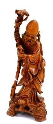 Lot 72 - An Oriental carved figure