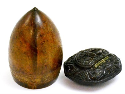 Lot 77 - A carved coconut shell and a carved snuff box (2)