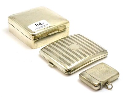 Lot 84 - A silver vesta engraved with a sentry box and sentinel, a silver cigarette box and cigarette case