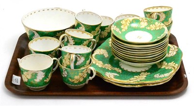 Lot 127 - An early 19th century green and gilt tea service