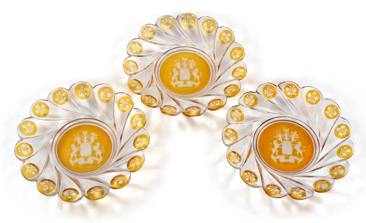 Lot 145 - A Set of Twelve Bohemian Amber Flash Armorial Plates, 2nd half 19th century, engraved with the arms
