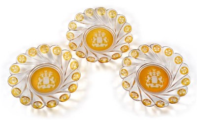 Lot 145 - A Set of Twelve Bohemian Amber Flash Armorial Plates, 2nd half 19th century, engraved with the arms