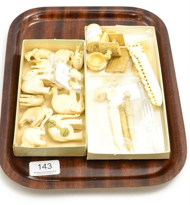 Lot 143 - A group of ivory circa 1920 including ivory handled fruit knife and fork, sewing implements,...