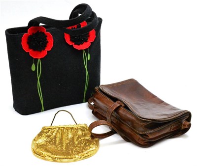 Lot 159 - Early Lulu Guinness handbag with protective cover, bridge leather shoulder bag and gilt evening bag