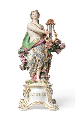Lot 149 - A Chelsea Porcelain Figure of Apollo, circa 1760, the loosely draped figure standing holding a...