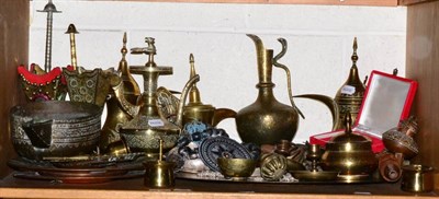 Lot 172 - A quantity of Middle Eastern brass and metal ware including ewers, vessels, hooka pipe,...