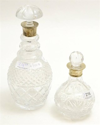 Lot 216 - A silver collared cut glass decanter of pineapple form, London 1977, and a silver collared cut...