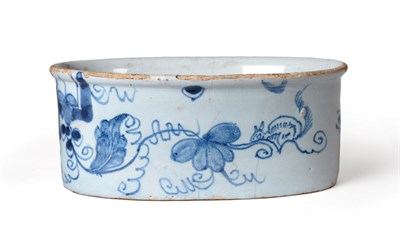 Lot 155 - An English Delft Potted Meat Pot, circa 1760, of oval form, painted in blue with a squirrel and...