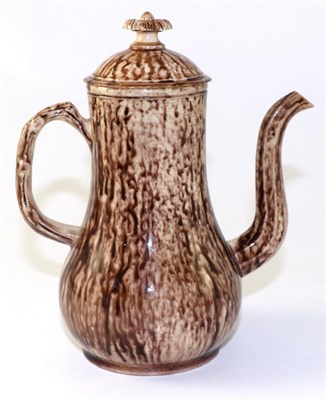 Lot 156 - A Staffordshire Tortoiseshell Glazed Coffee Pot and Cover, circa 1750, of baluster form with...