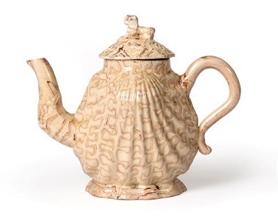 Lot 157 - A Staffordshire Agateware Pecten Shell Teapot and Cover, circa 1750, with scroll handle and...