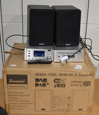 Lot 514 - A Sansui WMH700L Hi-Fi system, boxed  Sold PAT tested for electrical safety where possible but...