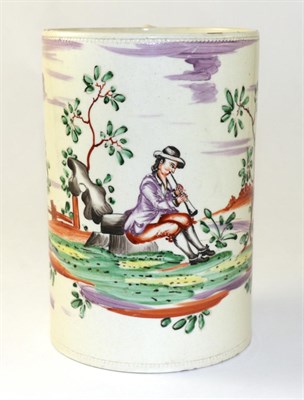 Lot 163 - A Creamware Mug, circa 1770, of cylindrical form with entwined strap handle, painted in colours...