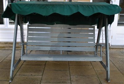 Lot 574 - A garden swing seat