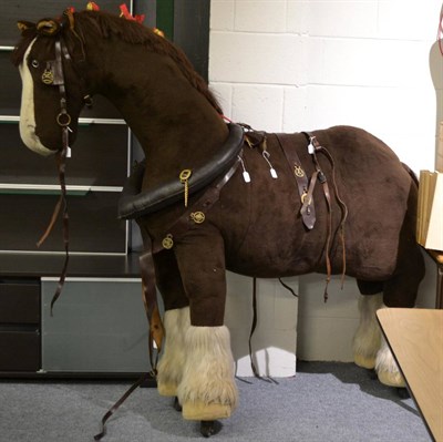 Lot 575 - A large Merrythought shire horse and harness