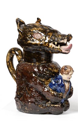 Lot 169 - A Pratt Type Pottery Bear Jug and Cover, circa 1800, naturalistically modelled seated holding a...