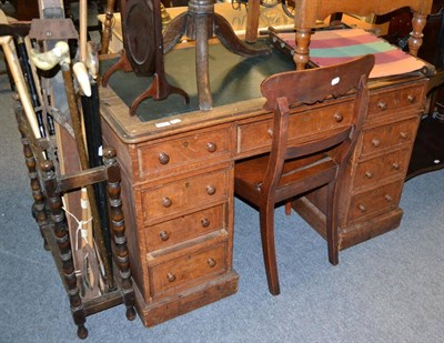 Lot 602 - An oak desk in need of restoration