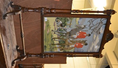 Lot 605 - An oak framed firescreen on trestle base