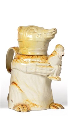 Lot 171 - A Pearlware Bear Jug and Cover, early 19th century, naturalistically modelled sitting holding a...