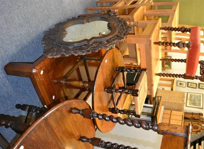 Lot 631 - A modern inlaid low coffee table and a carved oak oval shaped wall mirror