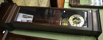 Lot 717 - An electric longcase clock, plaque attached to the backboard inscribed H Halliday, Manchester 1923