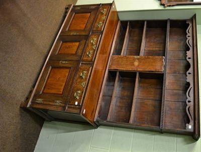 Lot 731 - George III oak dresser and rack, the upper section with central inlaid panel door and pierced...