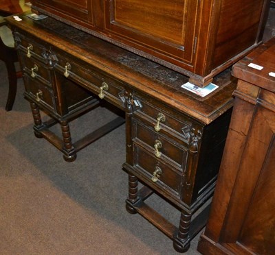 Lot 741 - An oak kneehole desk