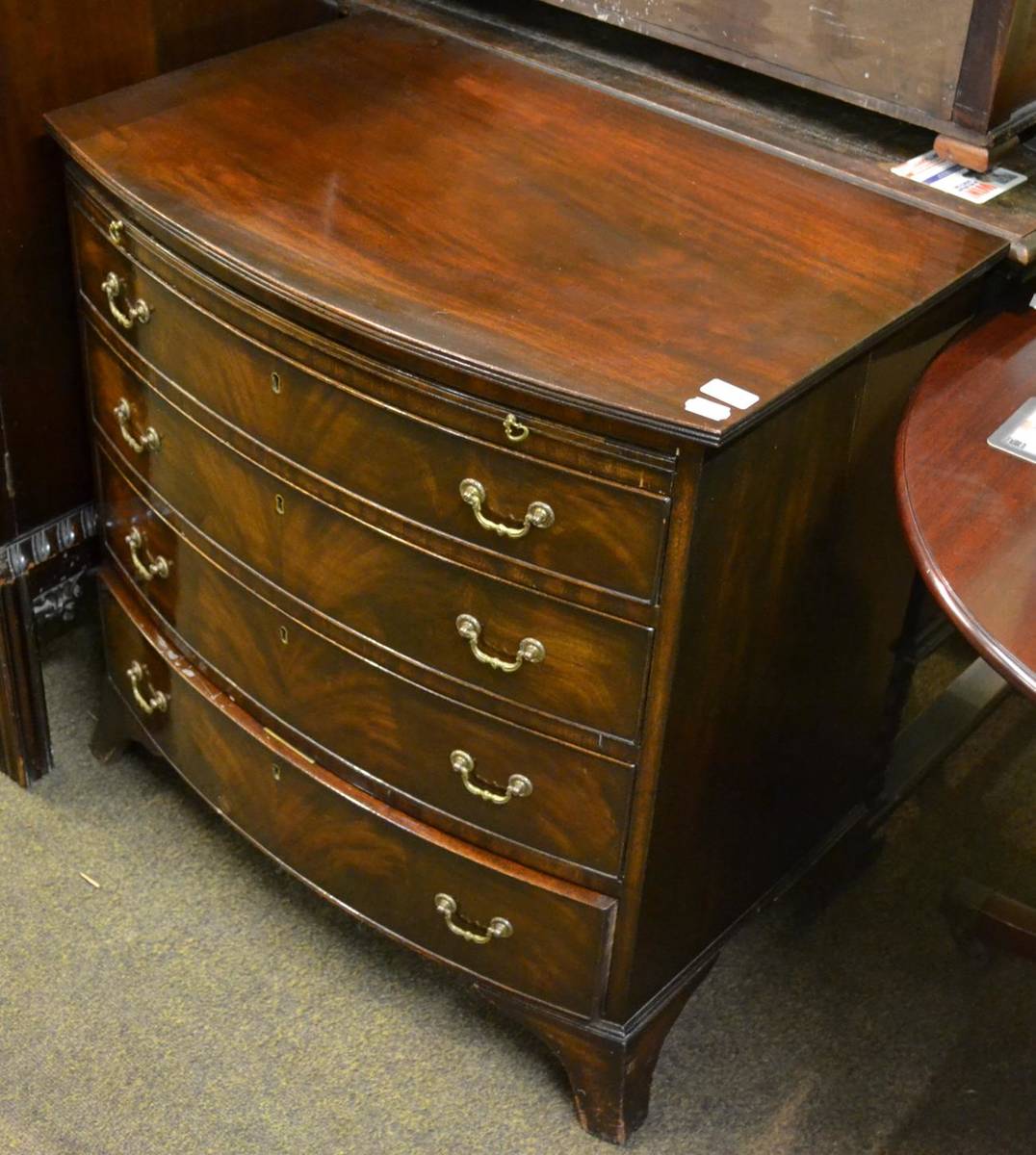 Lot 744 - Mahogany reproduction bow front bachelor's chest