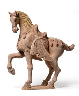 Lot 188 - A Chinese Painted Pottery Model of a Horse, Tang Dynasty (618-906AD), the standing beast with...