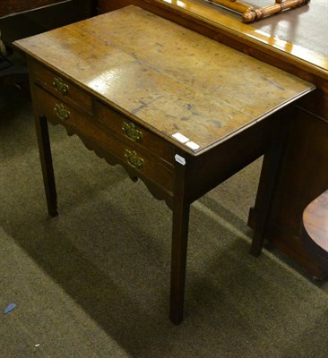 Lot 776 - George III oak provincial side table fitted with two short over one long drawer