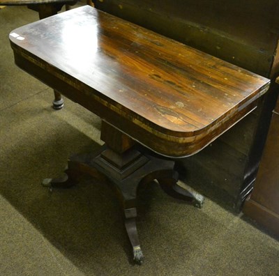 Lot 777 - A rosewood foldover tea table