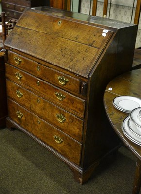 Lot 779 - George III oak bureau