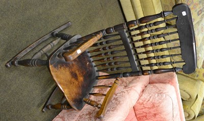 Lot 785 - An elm Windsor rocking chair