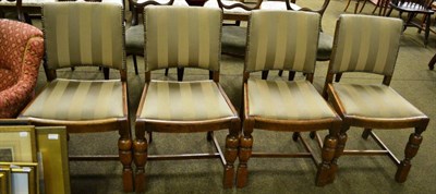 Lot 796 - A set of four 1920s oak Waring & Gillows dining chairs