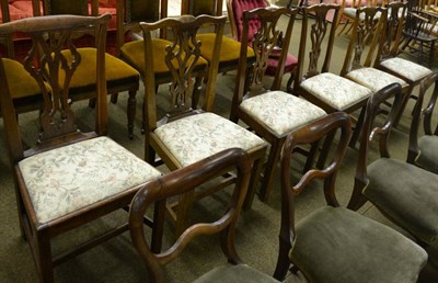 Lot 799 - A harlequin set of six oak dining chairs, each with yoke crest rail and carved splat