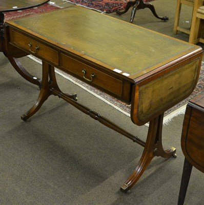 Lot 806 - A reproduction leather inset two drawer mahogany sofa table