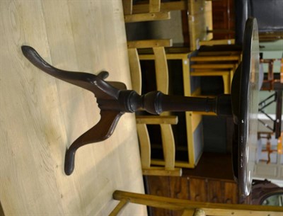 Lot 811 - A George II mahogany circular-topped tripod table