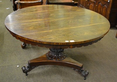 Lot 840 - Mid-19th century rosewood circular tilt top breakfast table on triform platform base