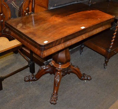 Lot 848 - William IV mahogany foldover tea table