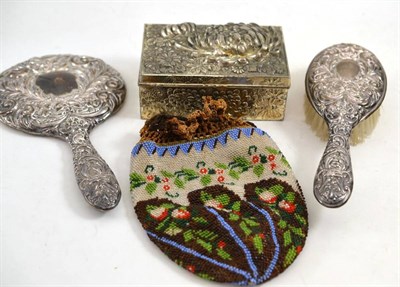 Lot 3 - A silver backed mirror and brush, a beadwork bag, three brooches and a plated casket