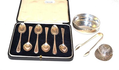 Lot 17 - A small silver dish, a jockey cap caddy spoon (modern), six coffee spoons and sugar tongs