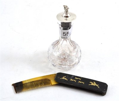 Lot 55 - A 19th century horn comb inlaid with a stag hunt and a cut glass bottle with plated...
