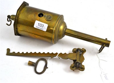 Lot 103 - A brass meat jack and bracket