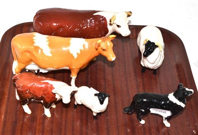 Lot 106 - Beswick figures - Hereford cow and calf, a Guernsey cow, a sheep, lamb and sheepdog (6)