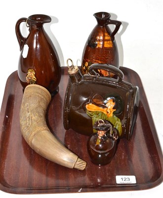 Lot 123 - Four pieces of brown glazed Doulton and a carved cow horn