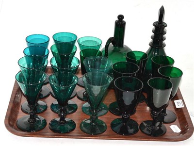 Lot 127 - Tray of 19th century green coloured glass including two decanters and eighteen drinking glasses...