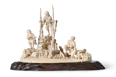 Lot 215 - A Japanese Ivory Figure Group, Meiji period, of a farmer working a waterwheel, another holding...